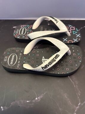 Havaianas Black Flip Flops with White Straps and Multicolor Icons